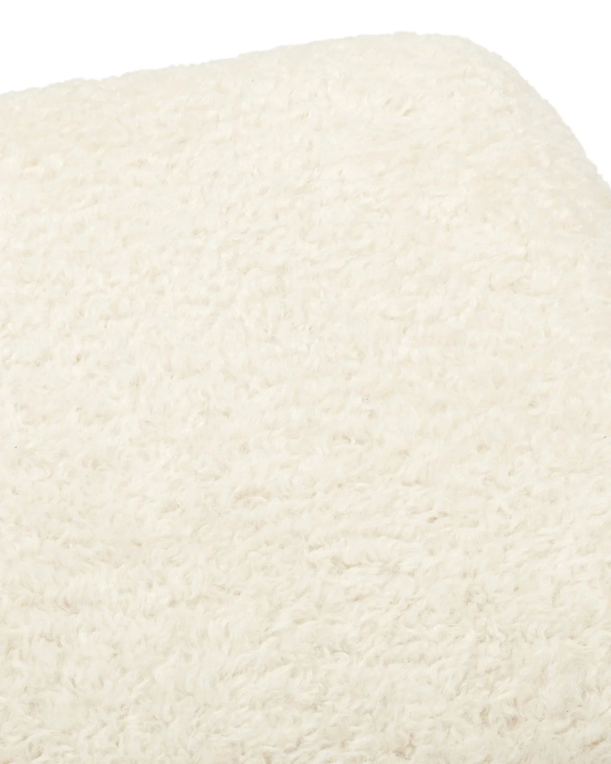 Jiya™ ottoman | vegan sheepskin - stools & ottomans jiya inspired by brasilia | madorne