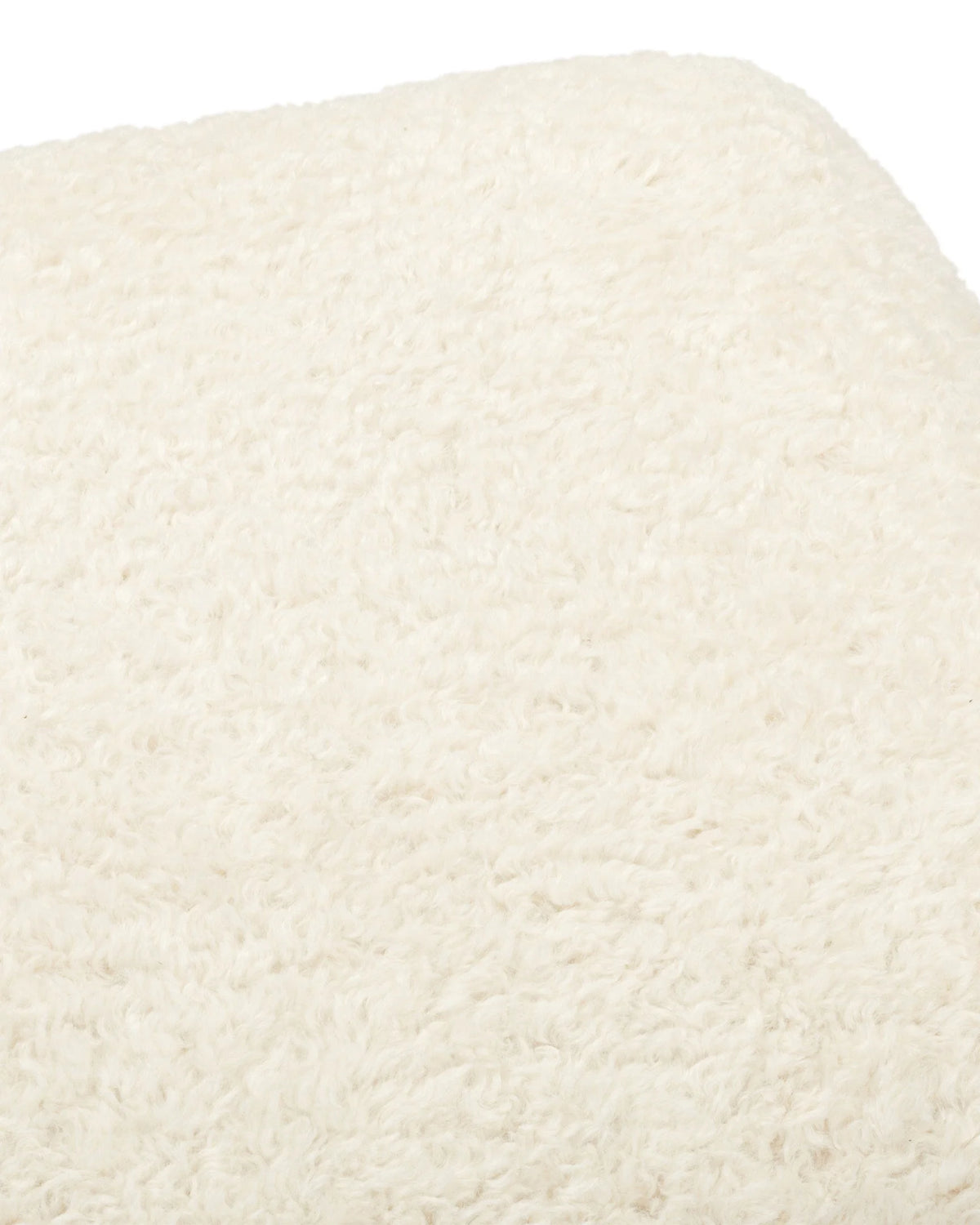 Jiya™ ottoman | vegan sheepskin - stools & ottomans jiya inspired by brasilia | madorne