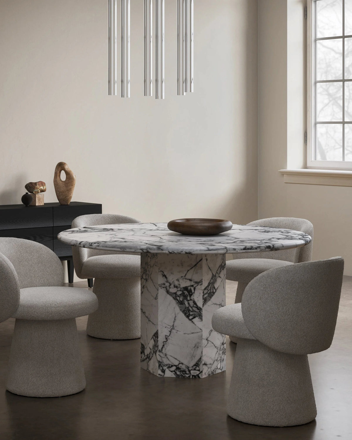 Sagan 55™ round dining table | travertine pedestal - tables epic table-inspired | madorne