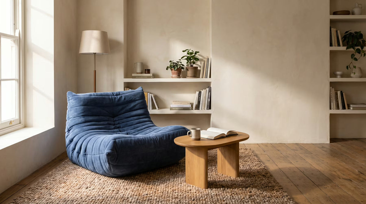 Blue Pogo chair in a compact reading corner